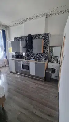 a kitchen with a stove and a sink at City Centre Studio - Charing Cross in Glasgow
