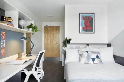 a bedroom with a white bed and a desk at For Students Only Westfield in Edinburgh in Edinburgh