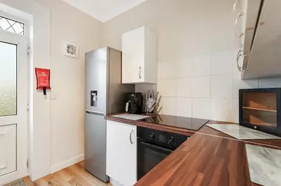 a kitchen with a counter top and a refrigerator at Free Parking - Central - Sleeps 6 - Great Location in Armadale