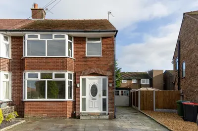 a brick house with a white door at FREE parking, LARGE House for Contractors & Families, Sleeps 5, 4 miles to BLACKPOOL in Moffat