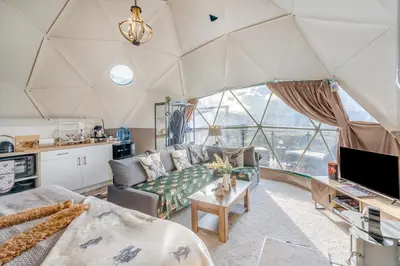 a living room with a couch and a tv in a tent at 1 Bed in Denny oc-h33665 in Denny