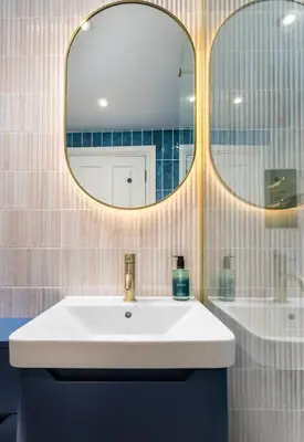 a bathroom with a sink and a mirror at Modern 1-Bed Retreat by Stirling Train Station in Stirling