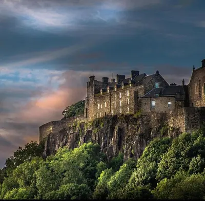 a castle sitting on top of a mountain at Family - Garden - Parking - WiFi - Sleeps 5 in Tullibody