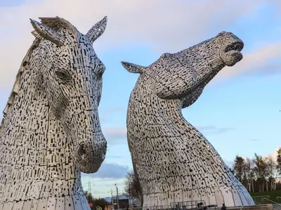 a statue of two horses standing next to each other at Beechtree Timber Lodge 69B in Denny
