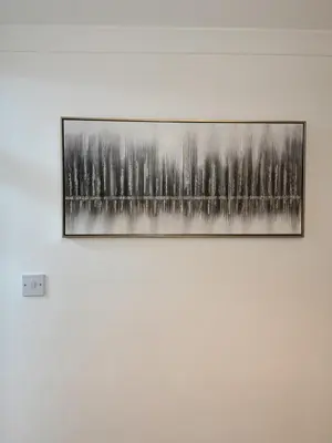 a picture of trees on a wall at The Telford Nook in Edinburgh