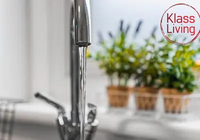 a kitchen sink with water running from a faucet at Mc Culloch Apartment by Klass Living Viewpark in Uddingston