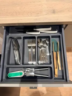 a tray with utensils sitting on a table at The perfect place we call home in Dumbarton