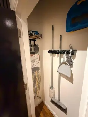 a kitchen with some utensils hanging on a wall at The perfect place we call home in Dumbarton