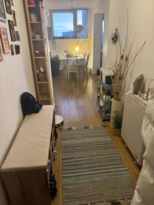a room with a table and a dining room at Skyline Serenity Cost Flat in Glasgow