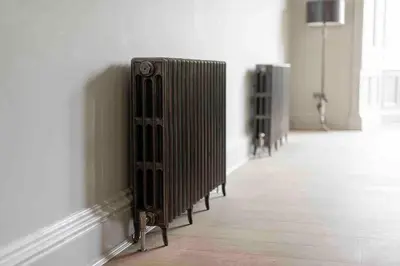 a room with two radiators on the side of a wall at Victorian Apartment - city centre - free car space in Edinburgh
