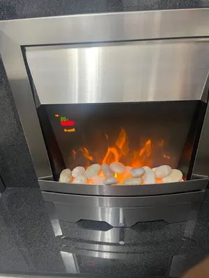 a oven with a bunch of food cooking in it at ShekNup Home in Edinburgh
