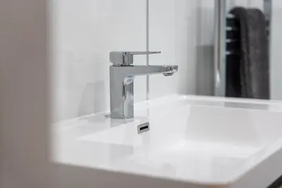 a sink with a faucet in a bathroom at Moffat Apartment with Hot Tub in Moffat
