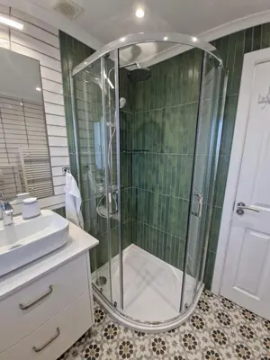 a bathroom with a shower and a sink at Justina's House in East Kilbride