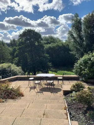 a table and chairs sitting on a patio at Sevenacres Kelso in Moffat