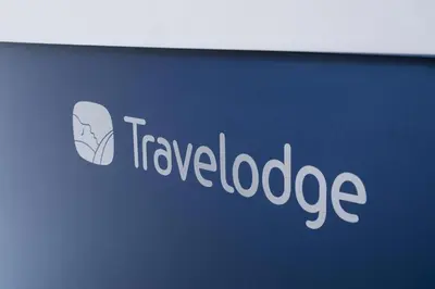 a sign with the words travel lookedage on it at Travelodge Falkirk in Polmont
