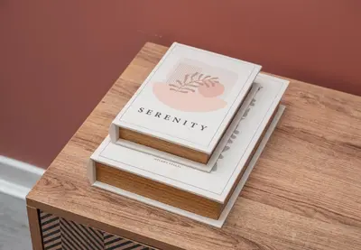 a book sitting on top of a wooden table at Vacant Nests Unique 4BR home The Muirhouse in Motherwell