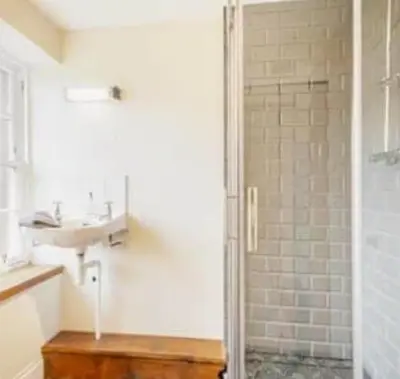 a bathroom with a shower and a sink at 3 Bed House - Mountain Views Bbq Firepit in Dunoon