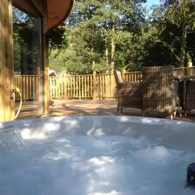 The Crannog Circular Riverside Retreat with Hot Tub