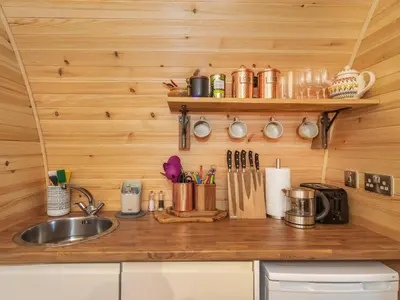 a kitchen with a sink and a counter with utensils at Now - Uk50567 in Port of Menteith