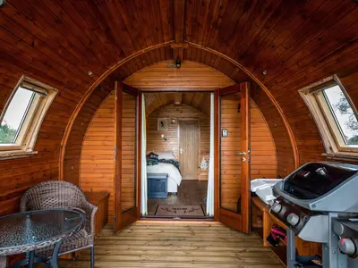a room with an arched doorway with a bed and a bedroom at Now - Uk50567 in Port of Menteith