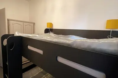 a pair of bunk beds in a room at Spacious 3 Bedroom Entire Apartment Self Check in & Free Parking in Cowdenbeath