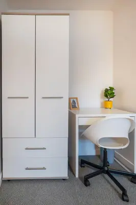 an office with a white desk and a white cabinet at Contractor & Family Friendly House - Sleeps 8 - FREE Parking and Fast Wi-Fi in Uphall