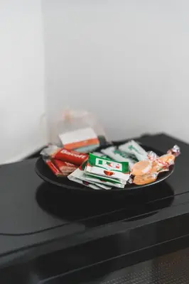 a plate of food on top of a table at Glenraith property in Hogganfield