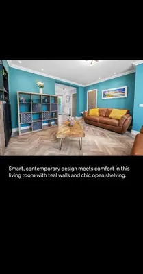 a living room with a couch and a coffee table at 2BR bed home peaceful central area free parking in Oban