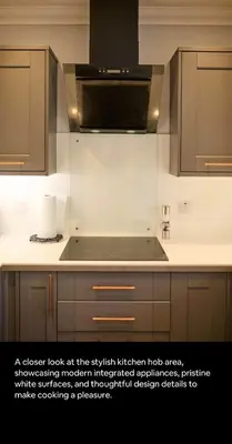 a kitchen with a stainless steel stove top oven at 2BR bed home peaceful central area free parking in Oban