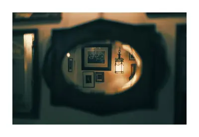 a view of a room through a circular mirror at Historic Hideaway - Dean Village in Edinburgh