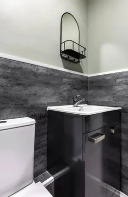 a bathroom with a sink and a toilet at Caledonia Suite by The Wallace Monument in Stirling