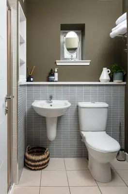 a bathroom with a toilet and a sink at Stylish Retreat Auchterarder in Auchterarder