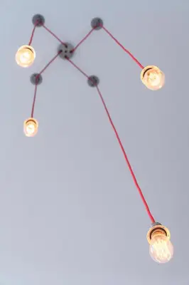 a group of three lights on a string at CITY CENTRE APARTMENT with Free Secure Underground Parking in Glasgow