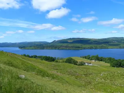 a view of a lake from a hillside at Blarghour Farm Cottages Overlooking Loch Awe in Ardchonnell