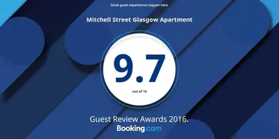 a sign with the on a blue background at Mitchell Street Glasgow Apartment in Glasgow