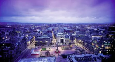 a view of a city at night with at Mitchell Street Glasgow Apartment in Glasgow