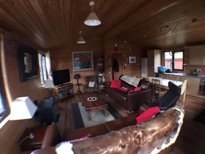 an overhead view of a living room with a couch at Lochlomondlodge22 in Rowardennan