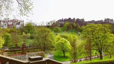 a view of a park with trees and buildings at Ramsay Gardens - Grand 4-Bedroom Apartment Next To Castle in Edinburgh