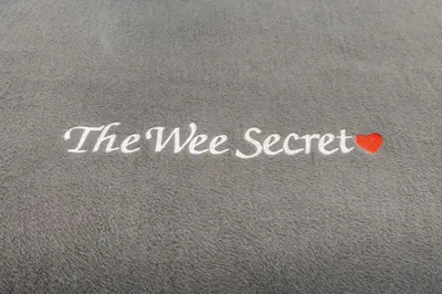 a paper with the word the me secret and a red heart at Loch Lomond Luxury Lodges in Drymen
