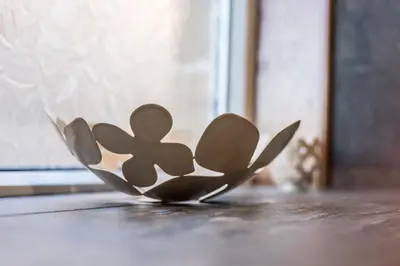 a wooden flower sculpture sitting on a table at Inverlea Guest House in Ayr