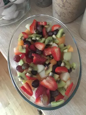 a bowl filled with fruit on top of a table at Thornbank House in Stranraer