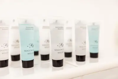a row of makeup products on a shelf at Dunfermline - Premium Two Bedroom Apartment - KW in Dunfermline