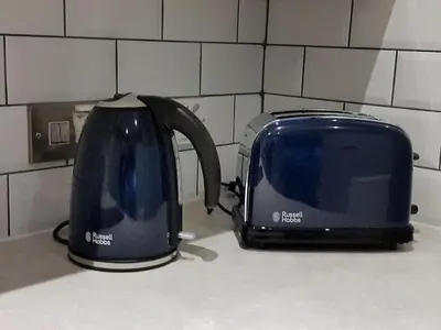 a toaster and a toaster on a kitchen counter at Edinburgh Nine in Edinburgh