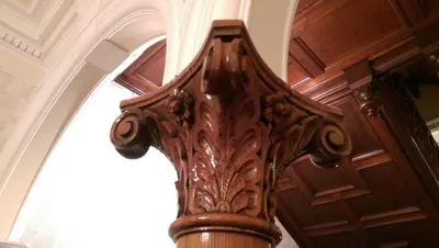 a wooden pillar in a room with a window at Lochinver Guesthouse in Ayr