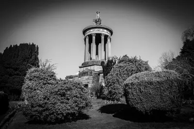 a black and white photo of a building with a clock tower at No5 Ayr Beach - Coorie Doon Stays in Ayr