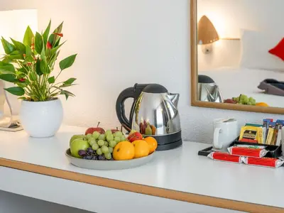 a bowl of fruit on a counter in a hotel room at Novotel Glasgow Centre in Glasgow