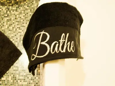 a black beanie with the word battle written on it at King Court Apartment in Motherwell