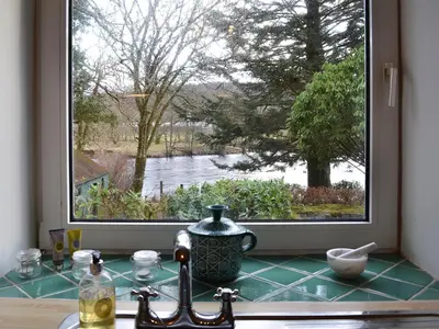 a kitchen counter with a window over a sink at Craig Lora in Dalmally