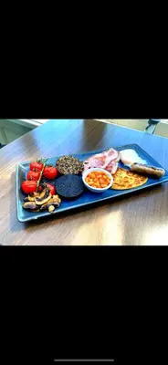 a tray of food on a wooden table at The Carradale Hotel in Carradale