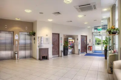 a lobby of a hospital with a waiting room at Holiday Inn Express - Glasgow - City Ctr Theatreland by IHG in Glasgow